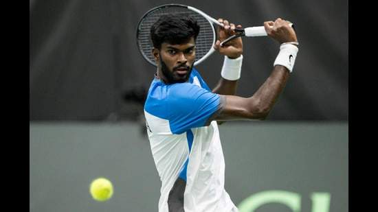 India's Dhakshineswar Suresh against Jerome Kym during the first match of the Davis Cup World Group I round against Switzerland. (AP) India's Dhakshineswar Suresh against Jerome Kym